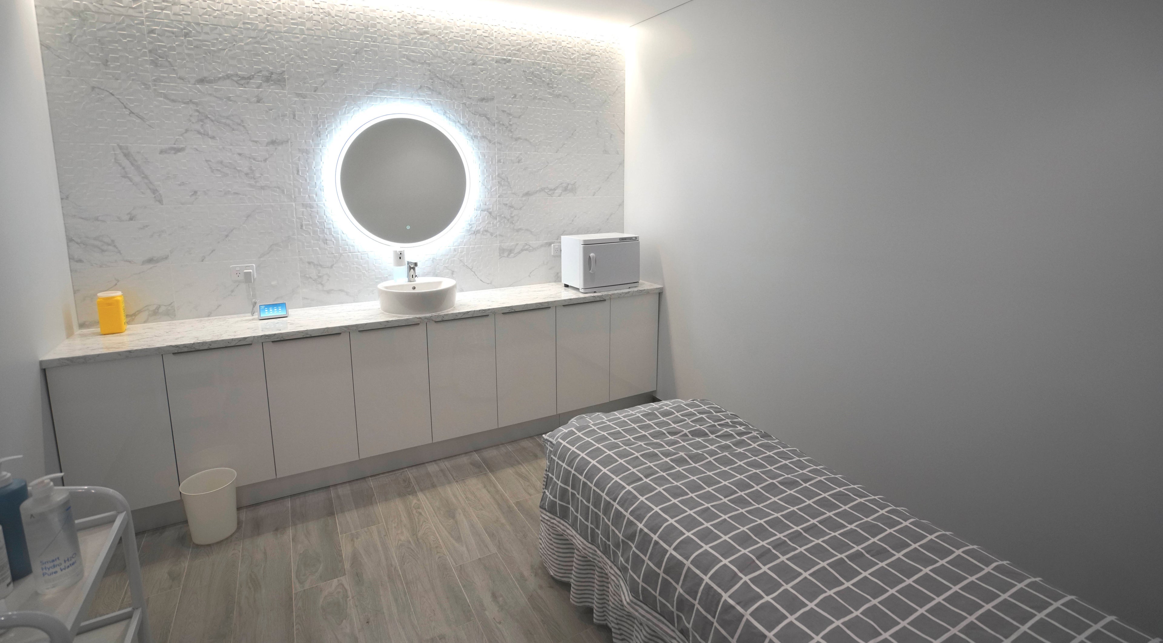Elegant treatment room at Hanmian Skin Clinic in Homebush, New South Wales, AU with modern amenities.