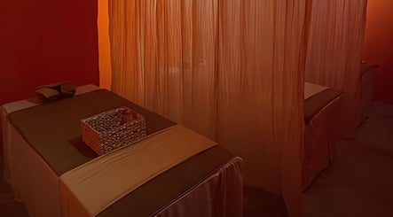Tranquil massage room at Tê Spa, Đà Nẵng, Đà Nẵng, VN with elegant curtains and relaxing ambiance.