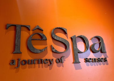 Tê Spa sign with orange background in Đà Nẵng, Đà Nẵng, VN, highlighting a journey of senses.