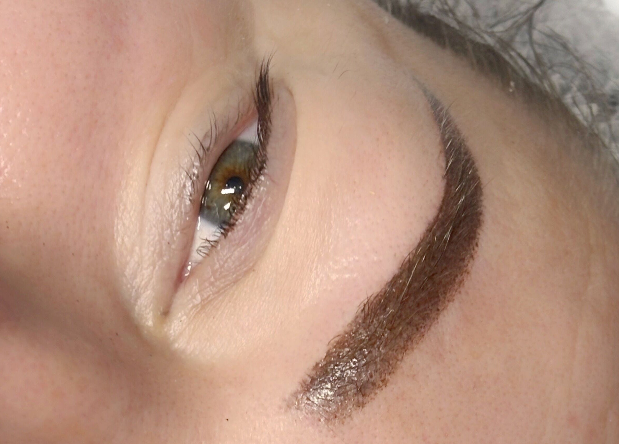 Close-up of expertly styled eyebrow at Lucyna Lashes, Milton Keynes, England, GB, showcasing precision artistry.