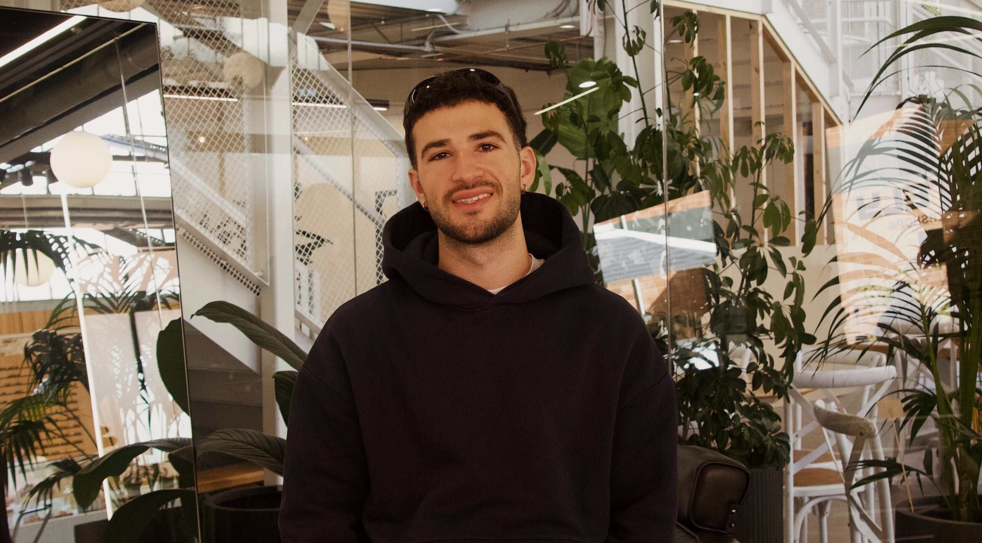 Modern interior of Rocky - Lately Barbershop, Bowden, featuring stylish greenery and cozy ambiance.