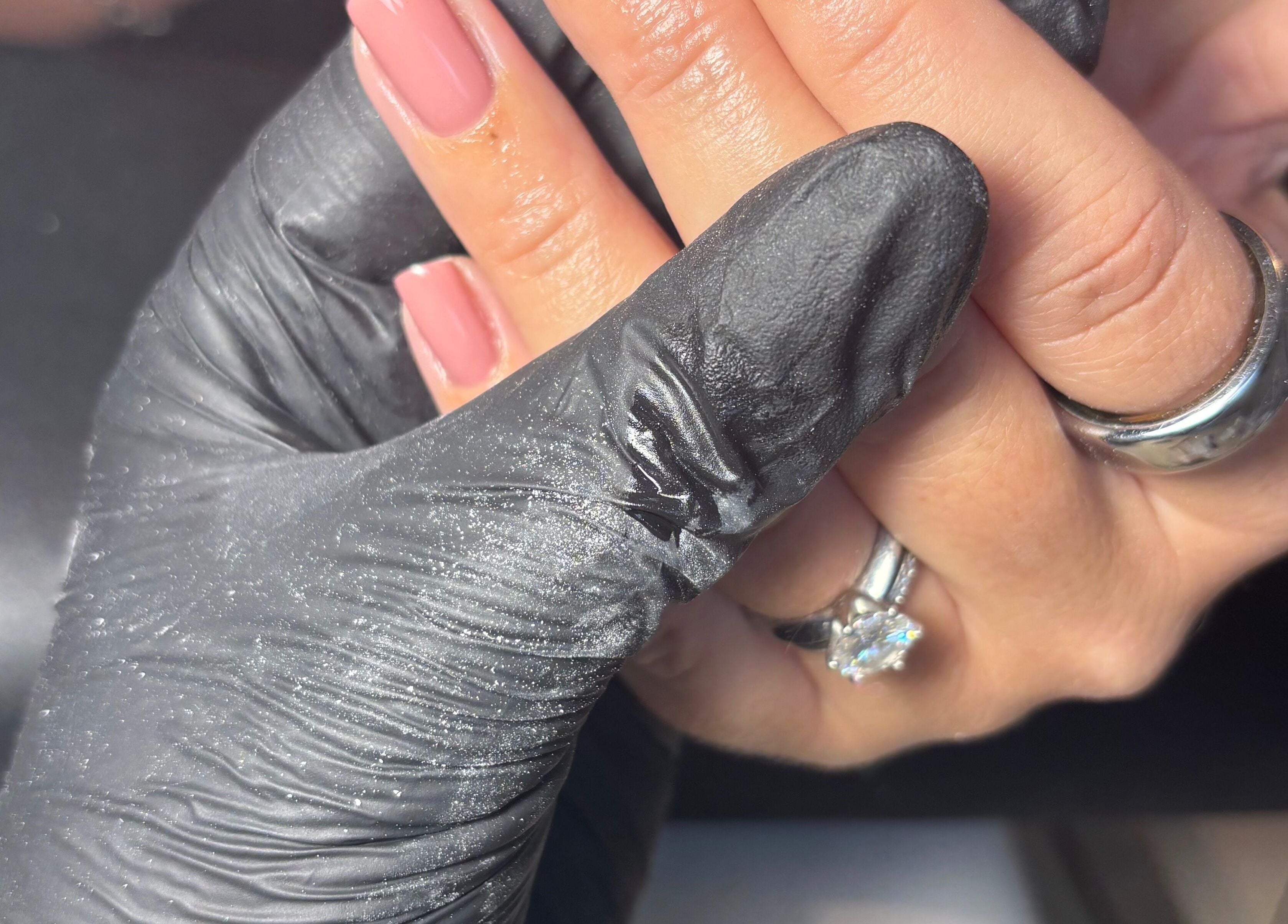 Professional manicure at Gnb Nail Studio, Broomfield, England, GB. Close-up of beautifully polished nails.