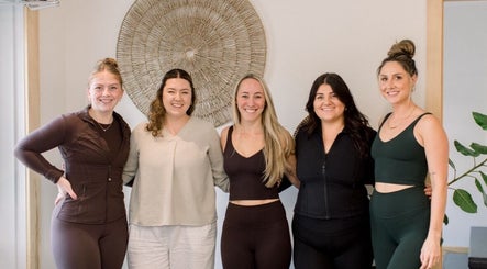Friendly staff at Le Saphir Esthetique in L’Orignal, Ontario, CA, standing in a welcoming space.