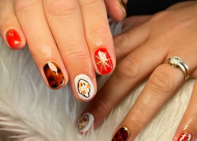 Intricate fall-themed nail art at Rockets Nails by Vicki, Beverley, England, GB.