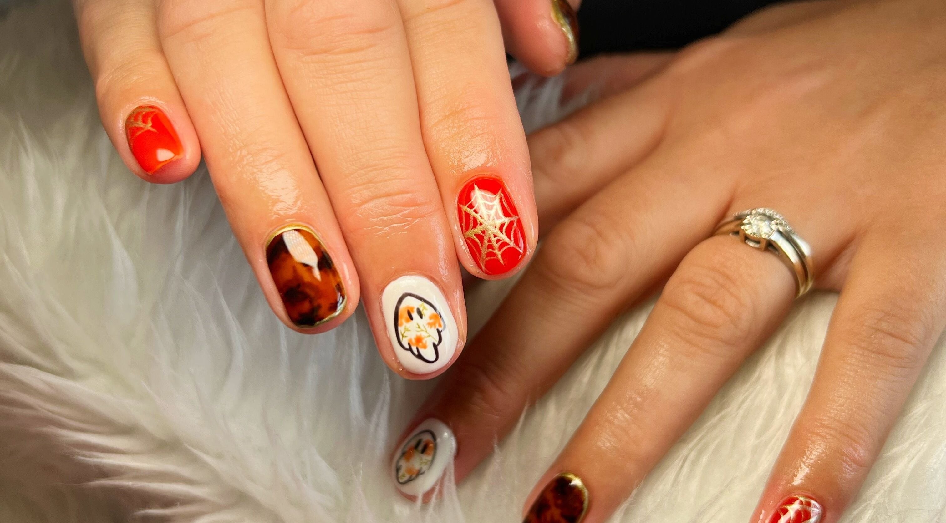 Intricate fall-themed nail art at Rockets Nails by Vicki, Beverley, England, GB.