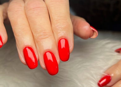 Red polished nails at Rockets Nails by Vicki, Beverley, England, GB. Elegant and stylish manicure.