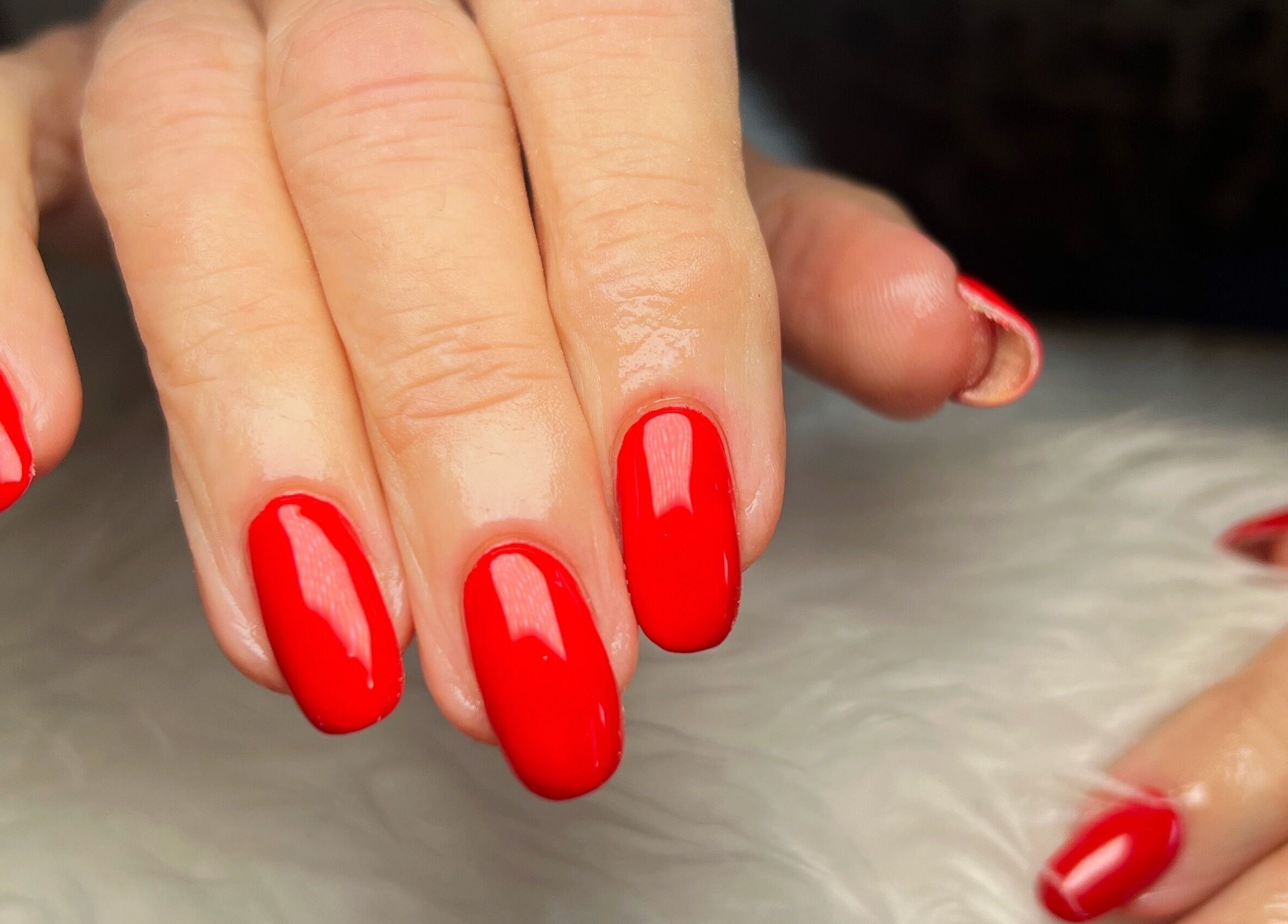 Red polished nails at Rockets Nails by Vicki, Beverley, England, GB. Elegant and stylish manicure.