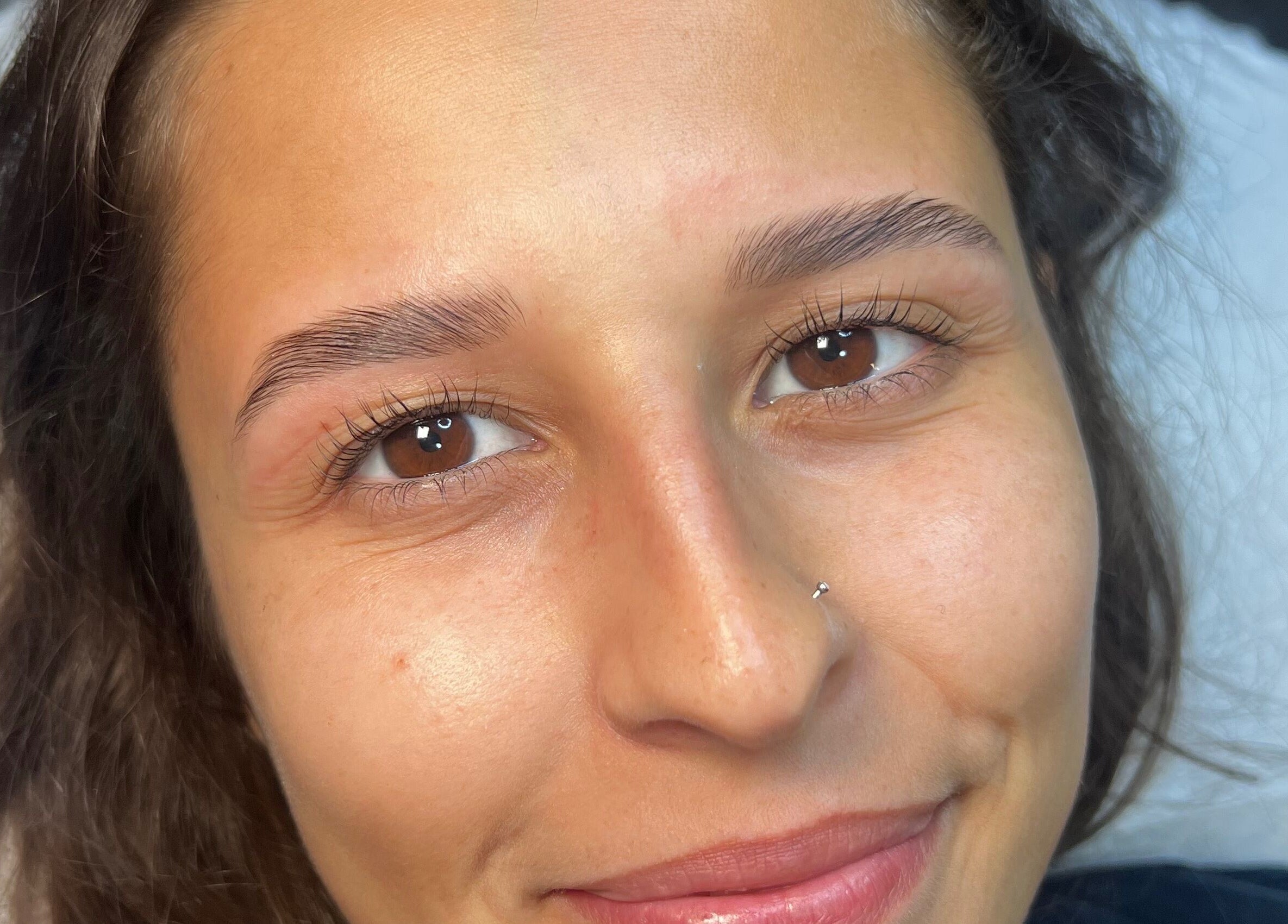 Sourire éclatant après soins visage à Studio SG, Longueuil, Québec, CA.