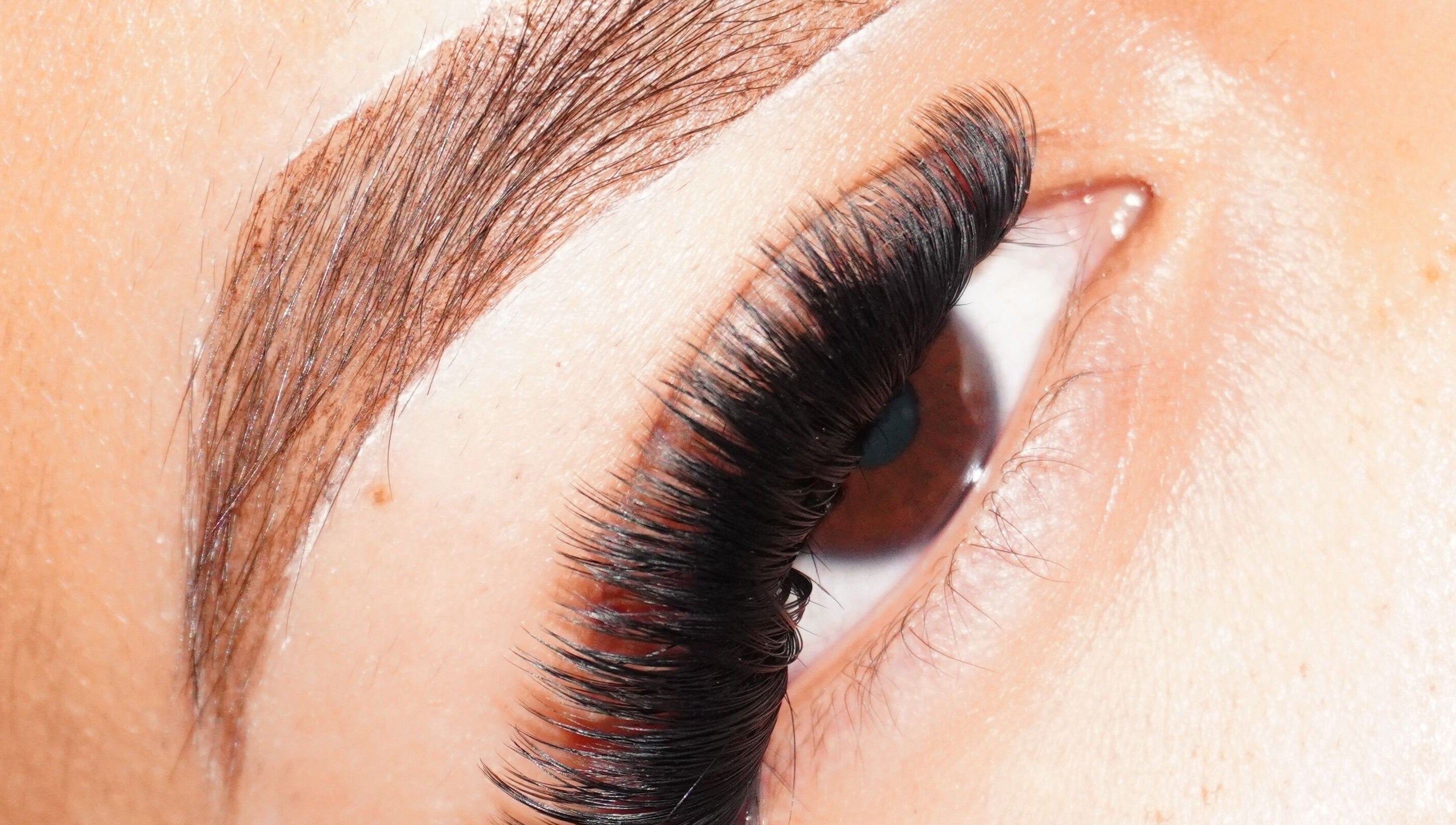 Close-up of expertly applied eyelashes at Alemán’s Muse, Orlando, Florida, US.