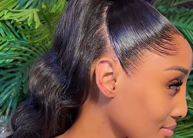 Woman with sleek hairstyle at Freeman Beauty Palace, Johannesburg, Gauteng, ZA.