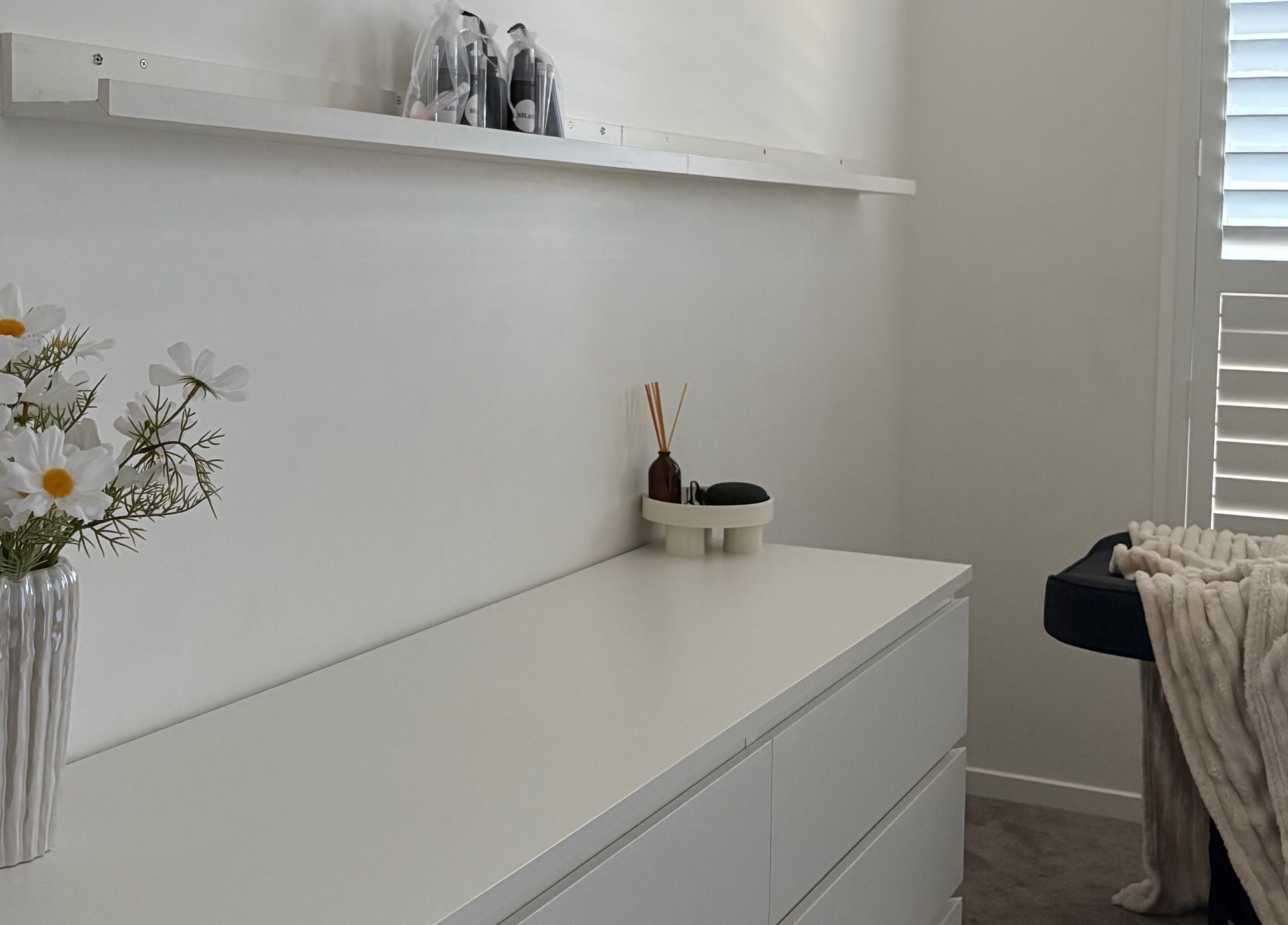 Tranquil treatment room at SSLASH in Caloundra West, Queensland, AU with soft lighting and calming decor.