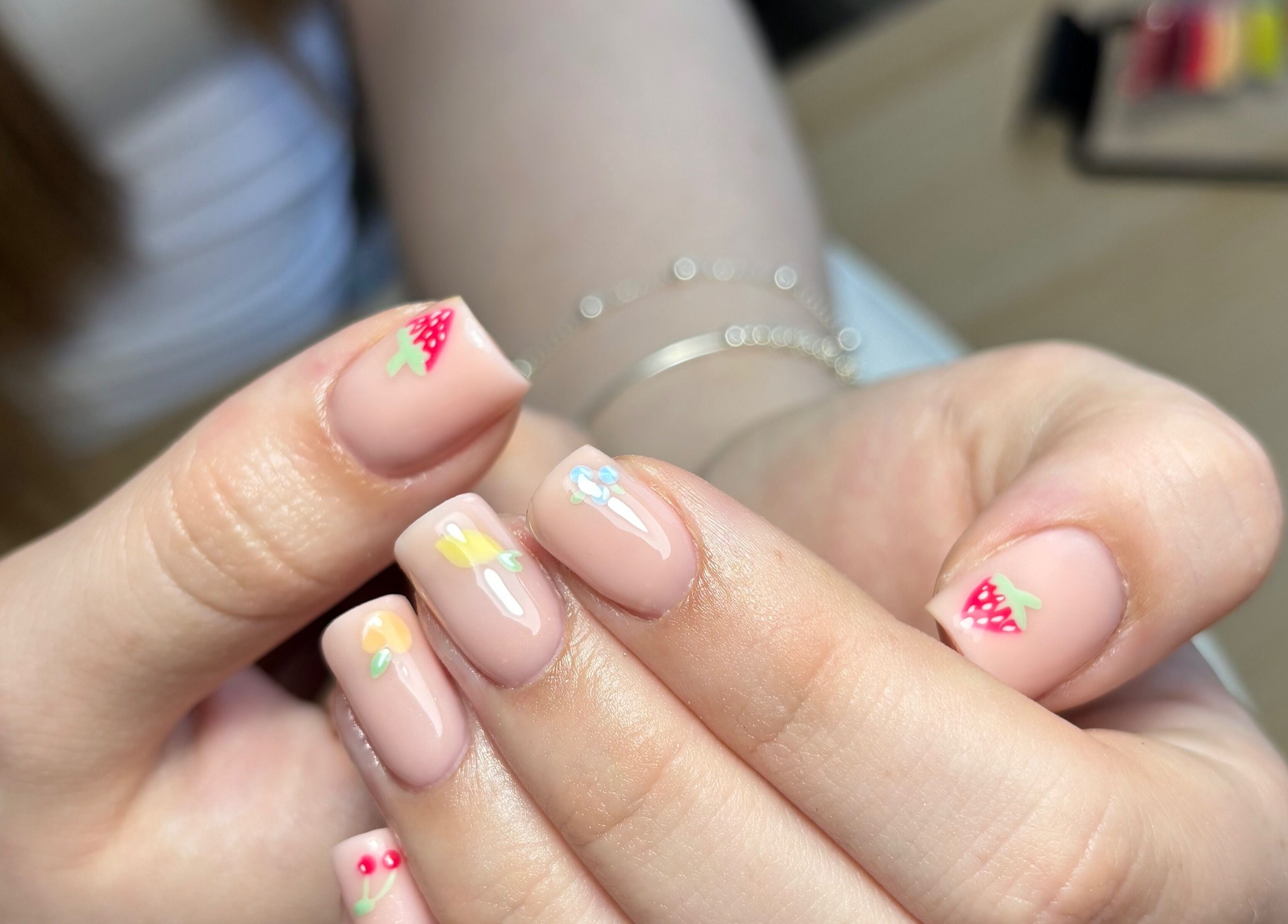 Colorful fruit nail art by By Lucy Ellenx in Stratford-upon-Avon, England, GB.