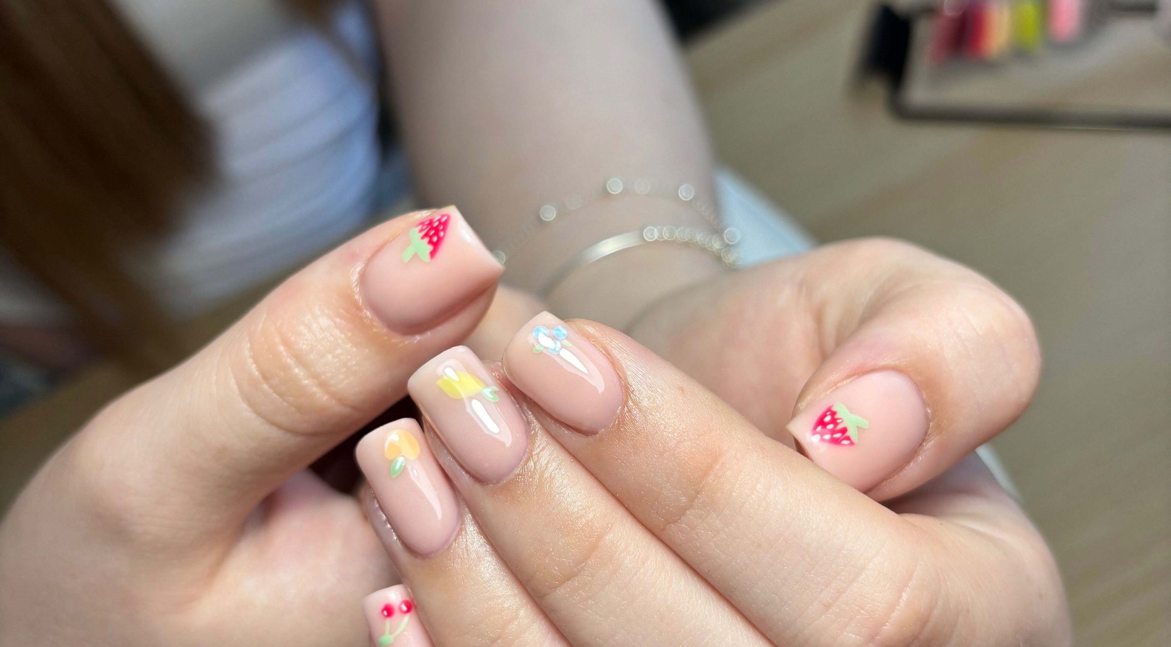 Colorful fruit nail art by By Lucy Ellenx in Stratford-upon-Avon, England, GB.