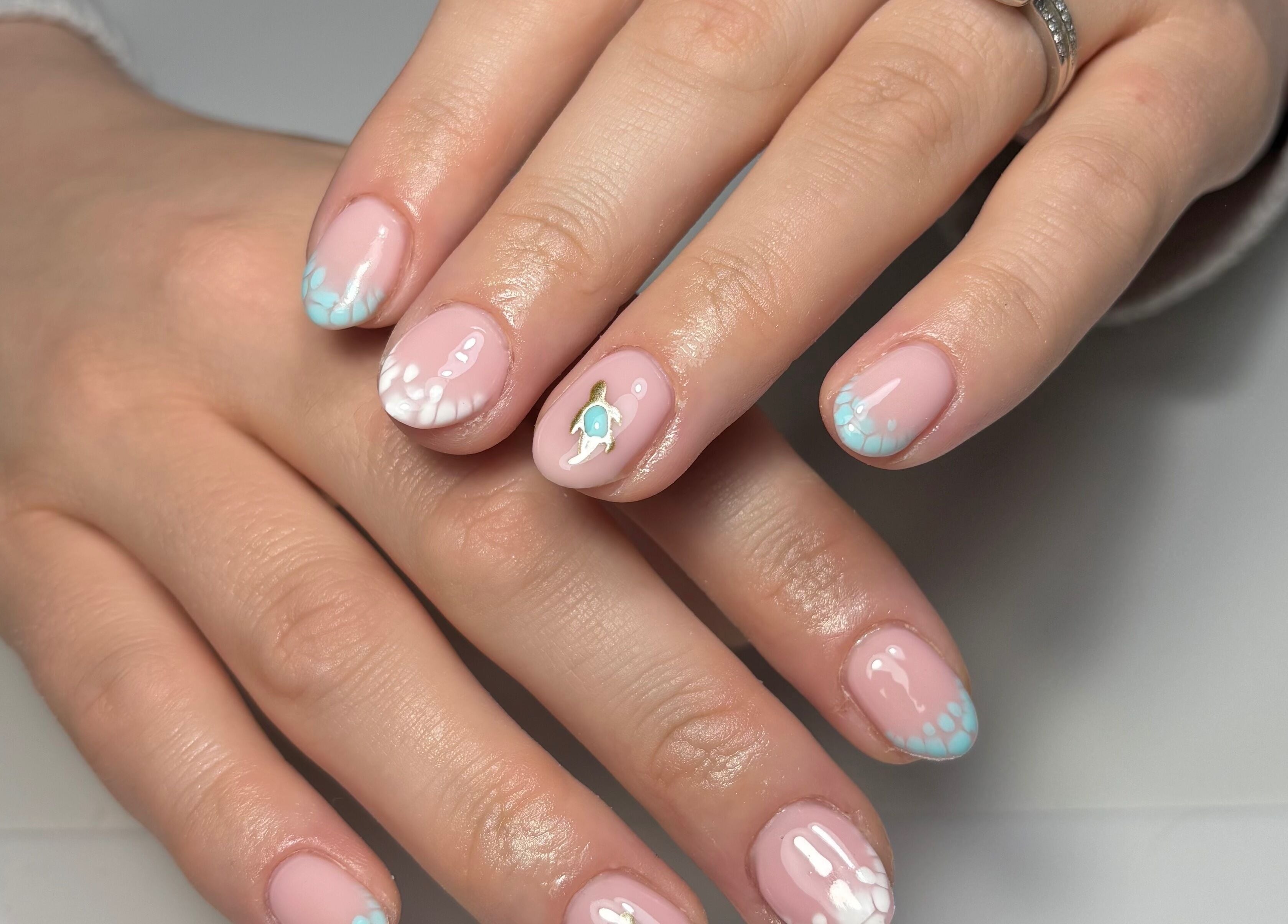 Pastel nail art manicure at By Lucy Ellenx, Stratford-upon-Avon, England, GB. Soft tones with delicate design.