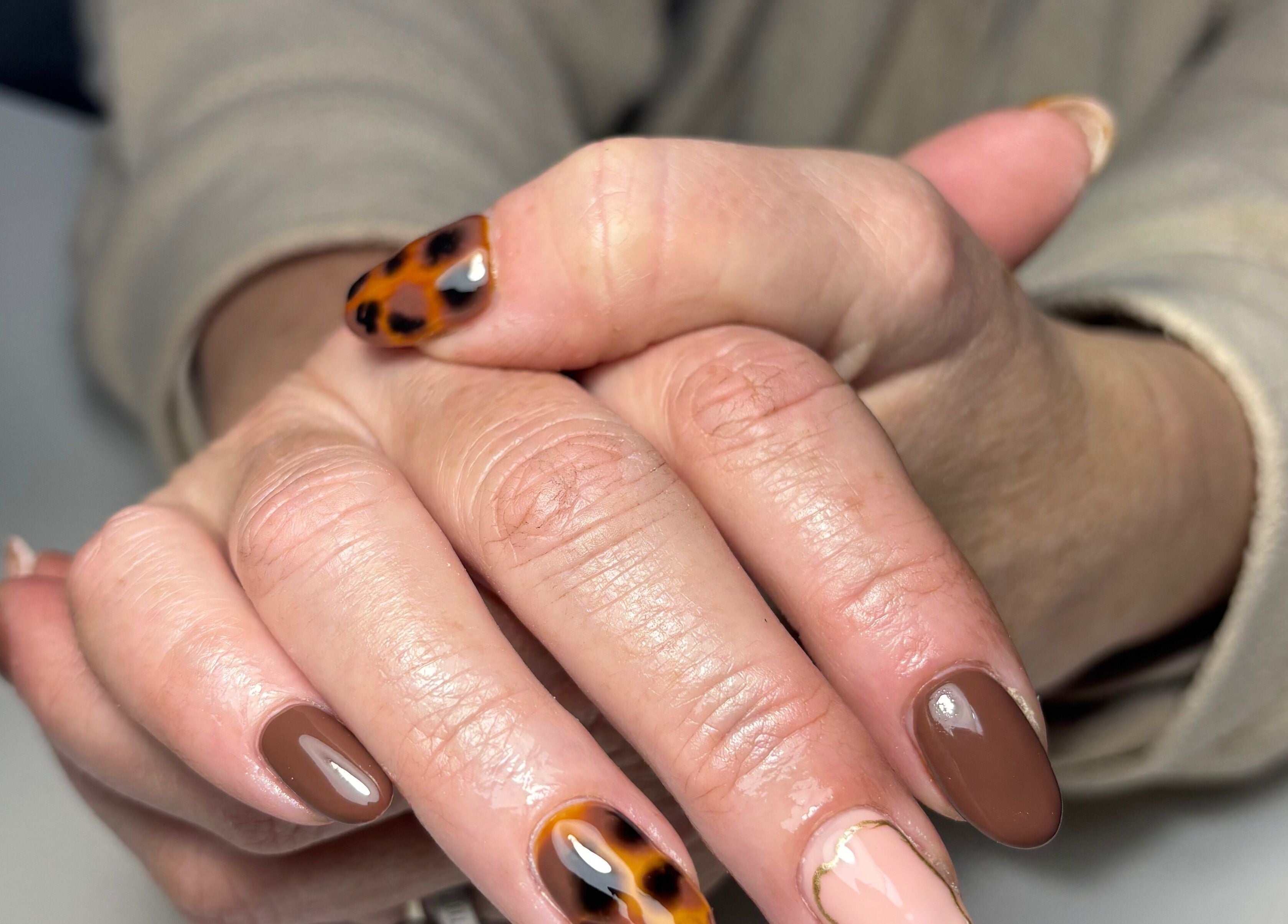 Elegant tortoise shell nails by Lucy Ellenx in Stratford-upon-Avon, England, GB. Perfect for stylish looks.