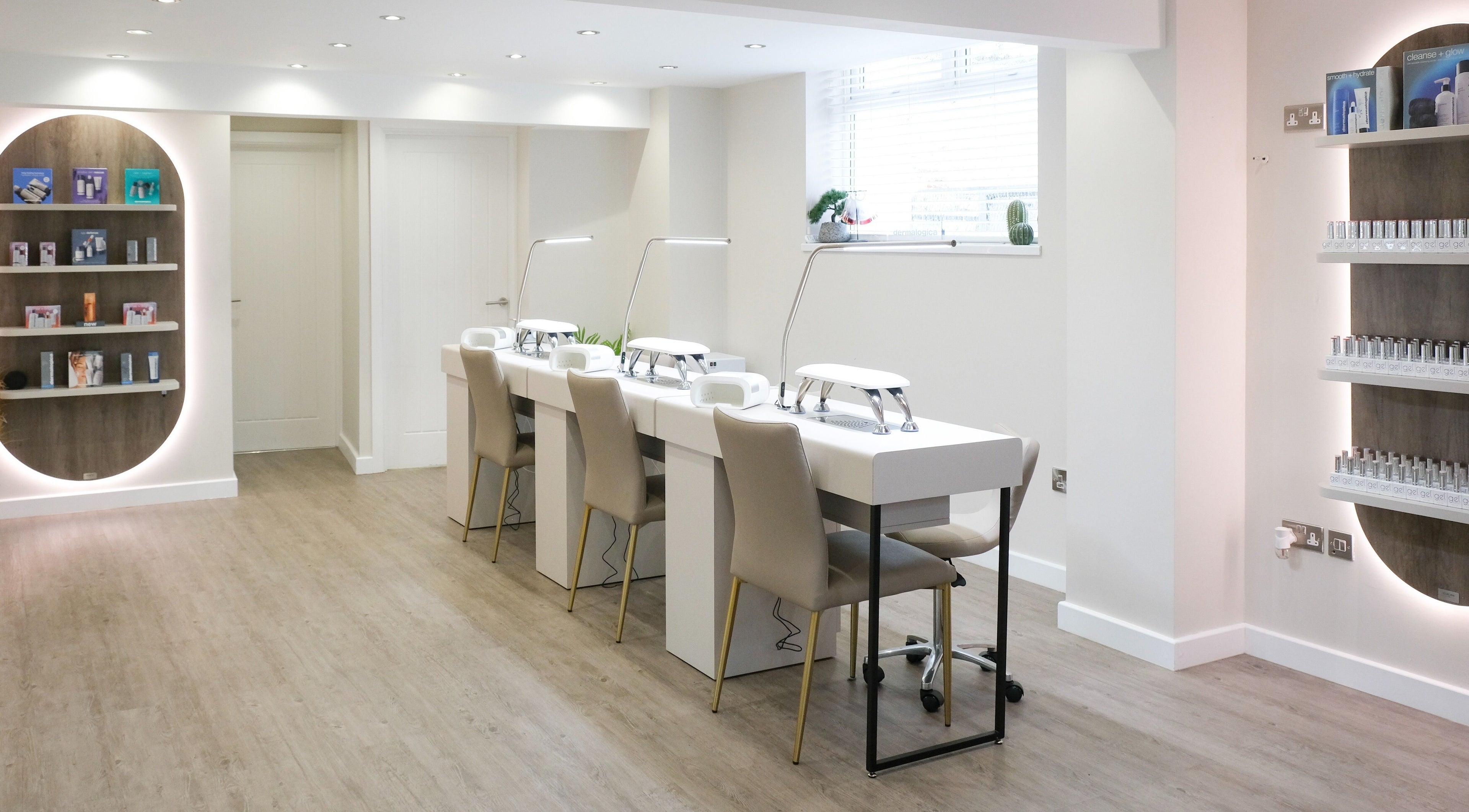 Elegant nail salon at Nova, Clitheroe, England, GB featuring modern nail stations and chic decor.