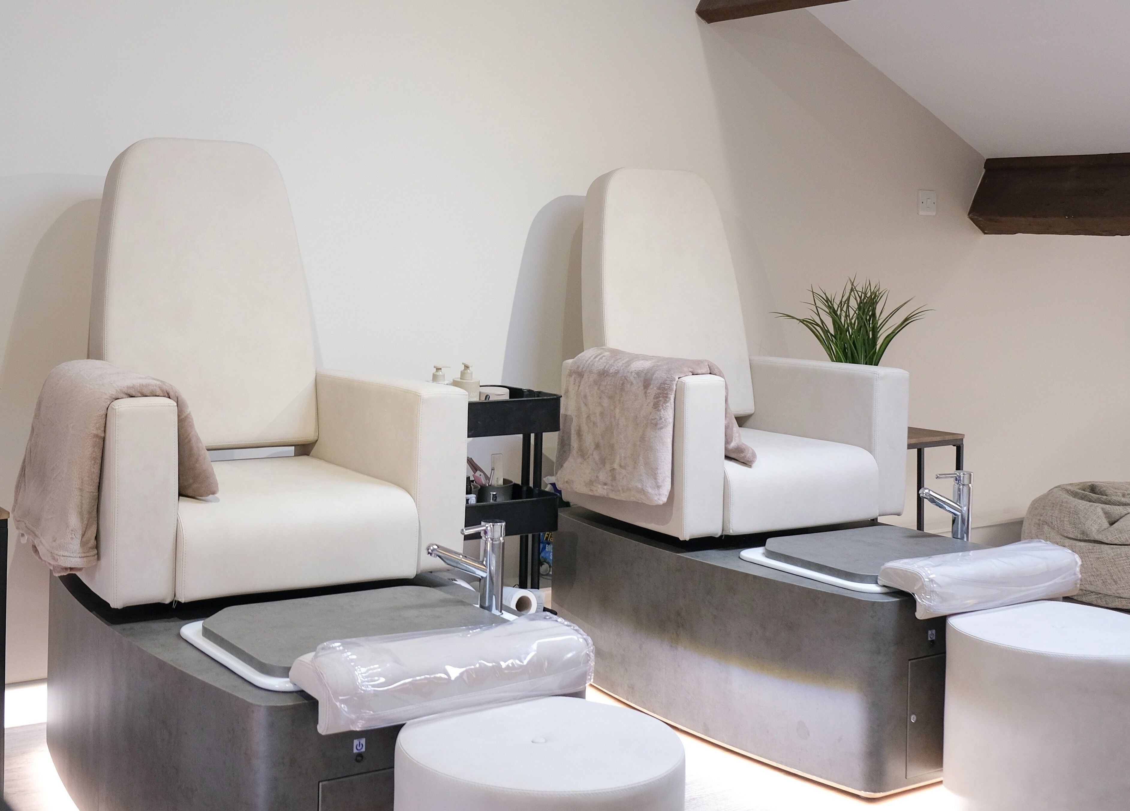 Luxurious pedicure chairs at Nova, Clitheroe, England, GB offering a relaxing spa experience.