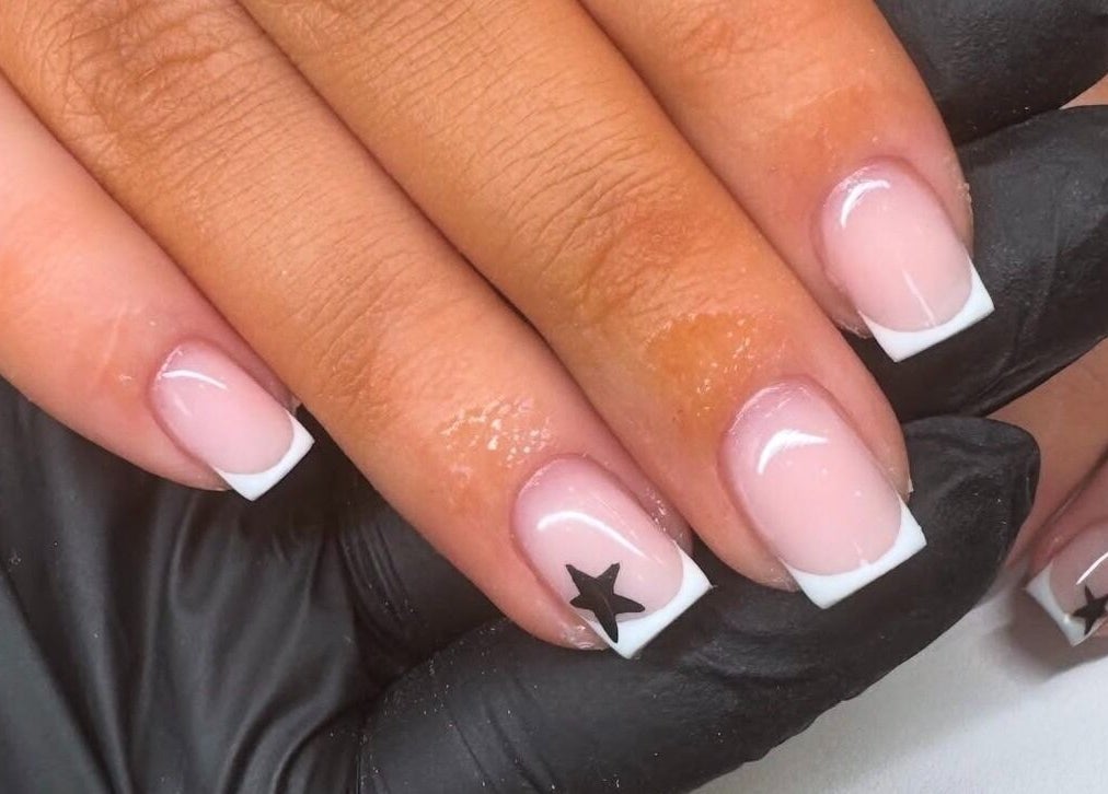 Elegant star nail design at Nova, Clitheroe, England, GB showcasing exquisite manicure artistry.