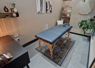 Bee Revived massage room with decor in Manchester, England, GB.
