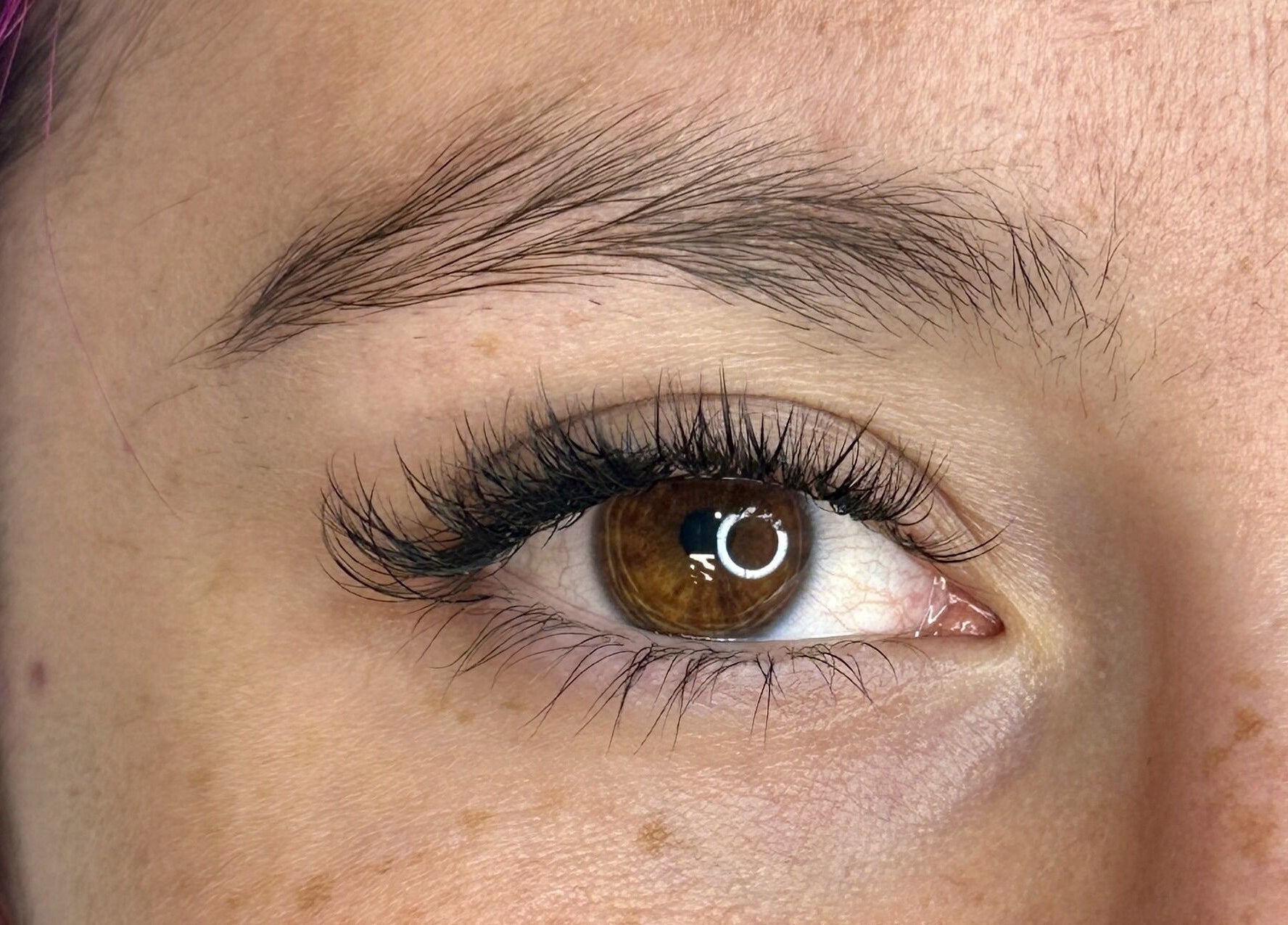 Close-up of eye with elegant lashes by Lashes by Katie and Skincare in Bethesda, Maryland, US.