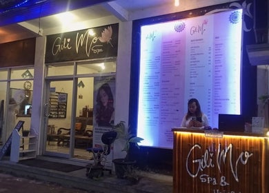 Front view of Gili Mo Beauty Spa & Hair Salon, Nusa Tenggara Barat, ID, warmly lit exterior at night.