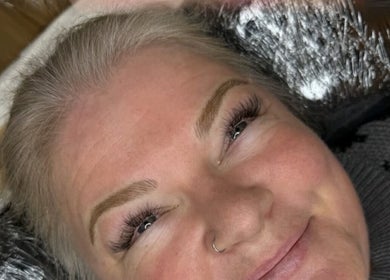 Close-up of a woman with styled brows and lashes at By Megan Robinson in Plymouth, England, GB.