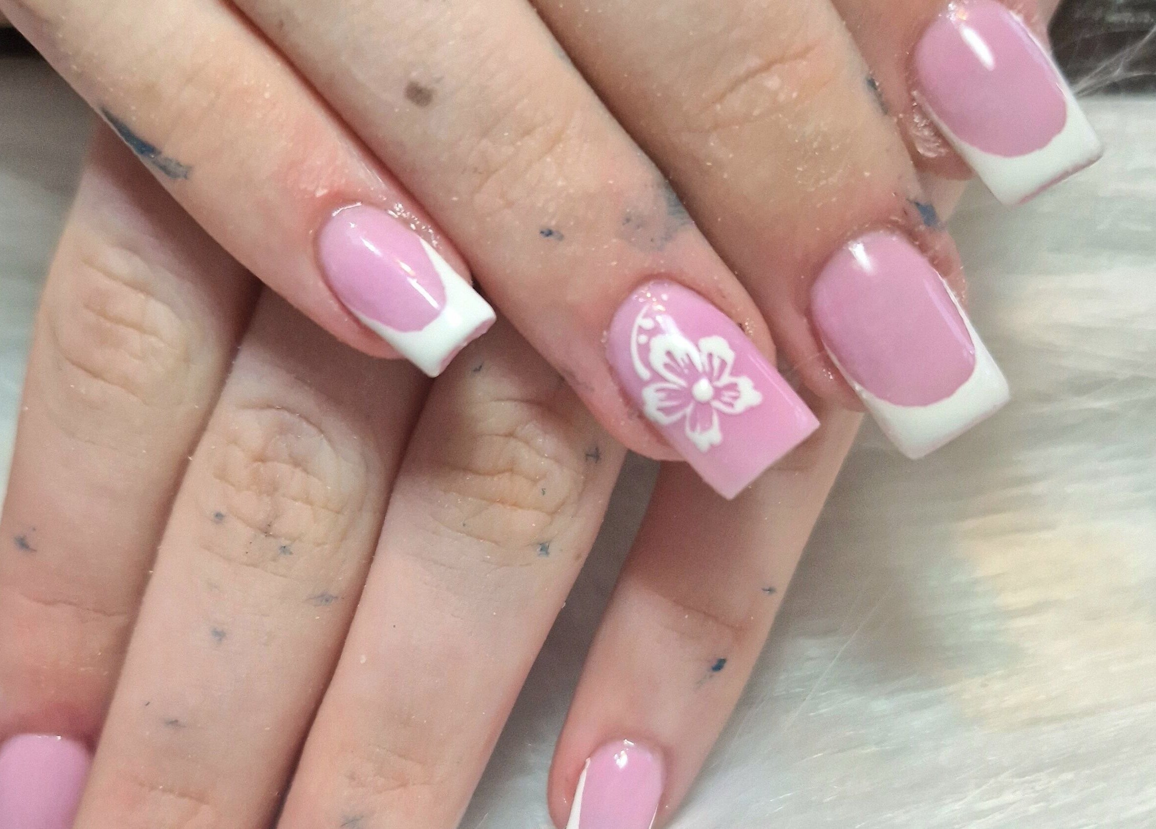 Elegant pink and white floral nails at Fantasy Nails, Holyhead, Cymru, GB.