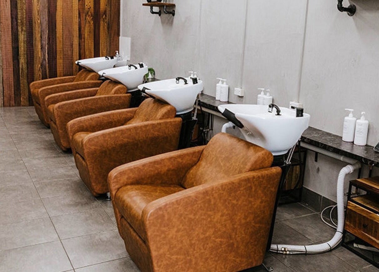 Luxurious hair wash stations at Soho Hair Salon in Narellan, New South Wales, AU offer comfort and style.