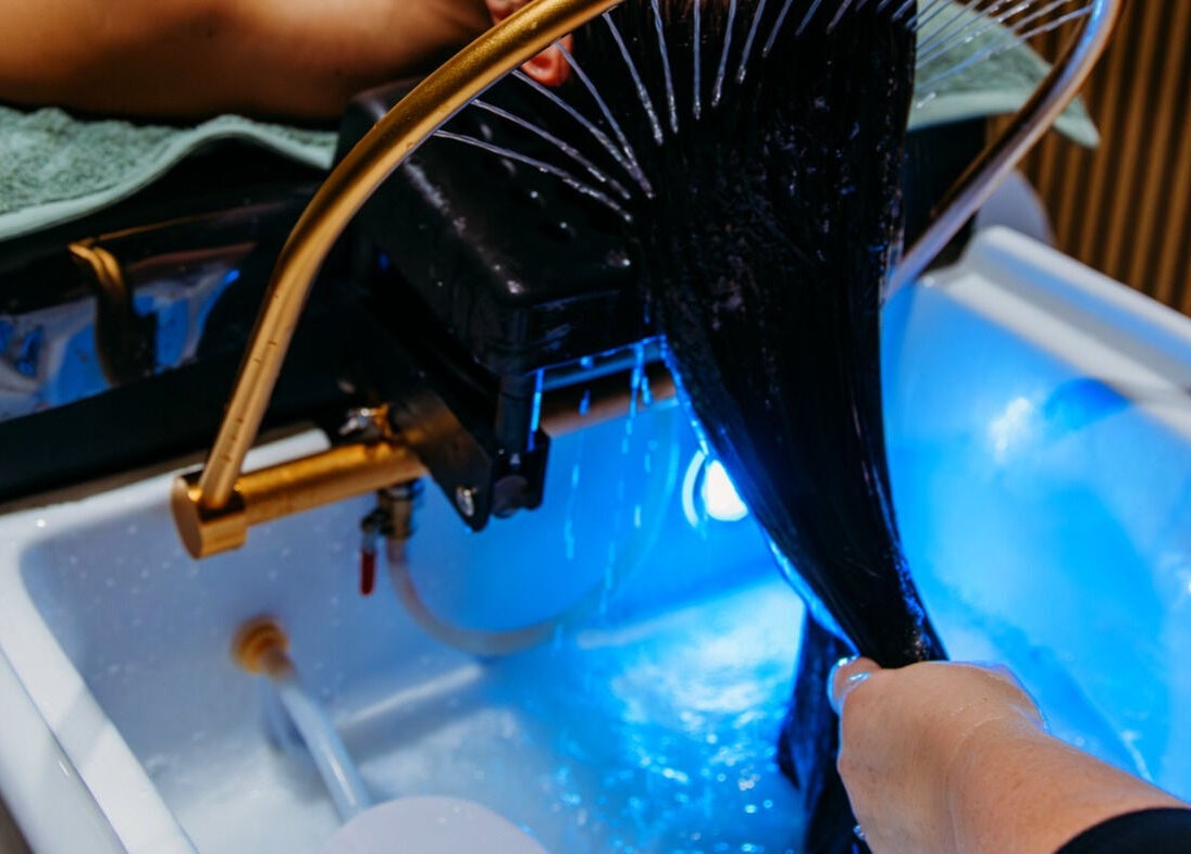 Hair washing treatment at Soho Hair Salon, Narellan, New South Wales, AU using modern equipment.