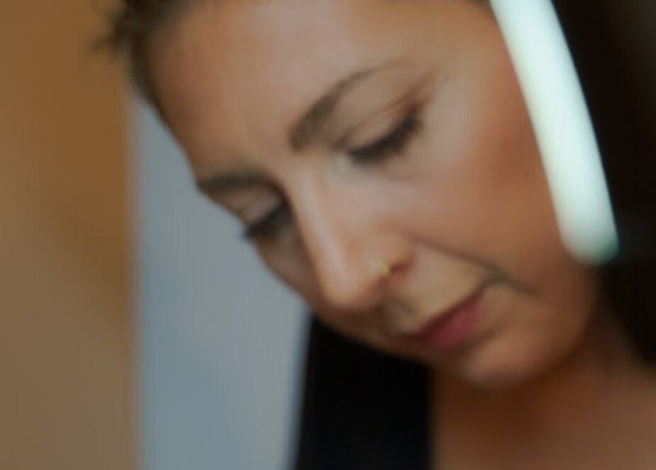 Close-up of a serene face during a treatment at Kanti Studio, Colwick, England, GB.