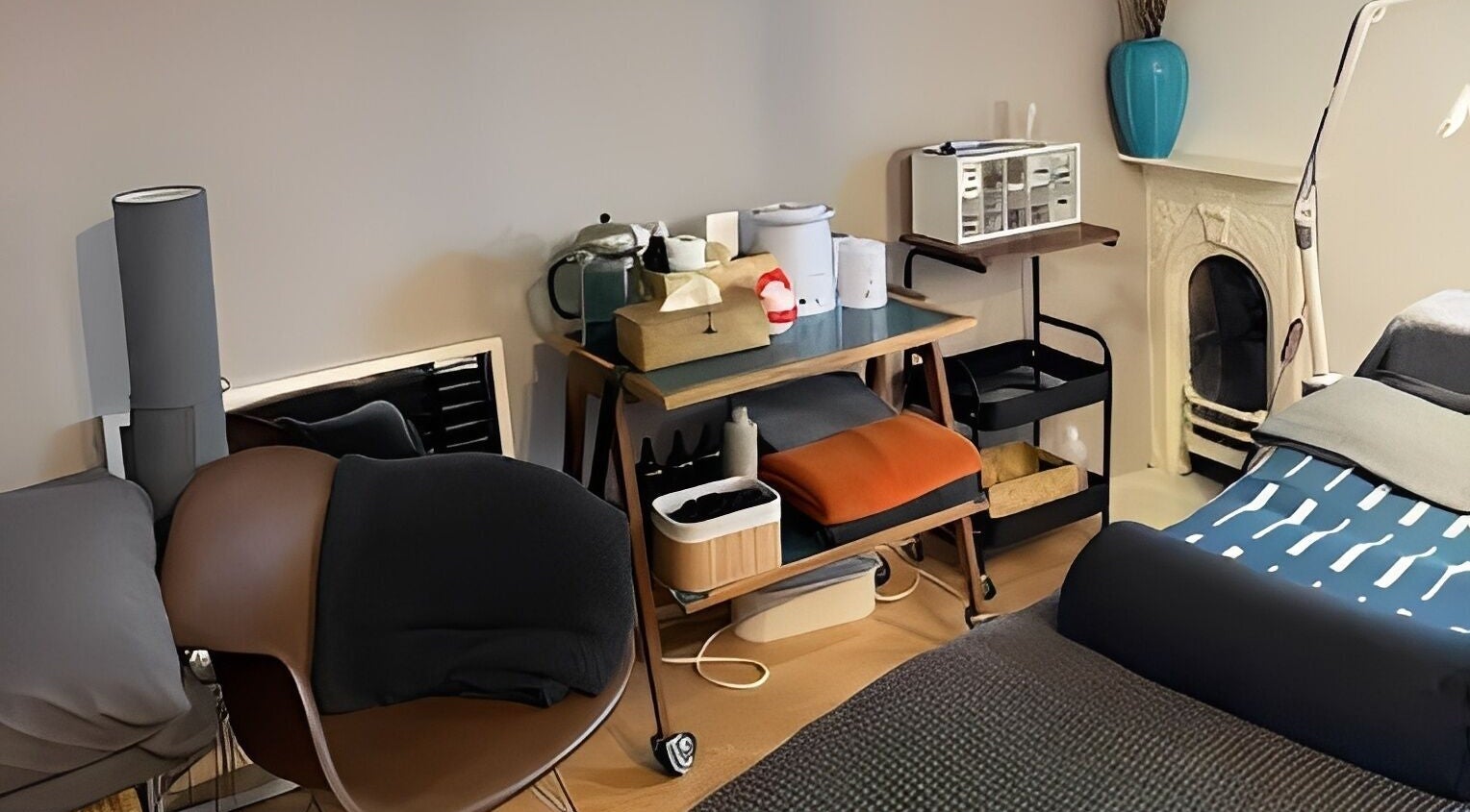 Kanti Studio therapy room in Colwick, England, GB with a cozy massage setup and calming décor.