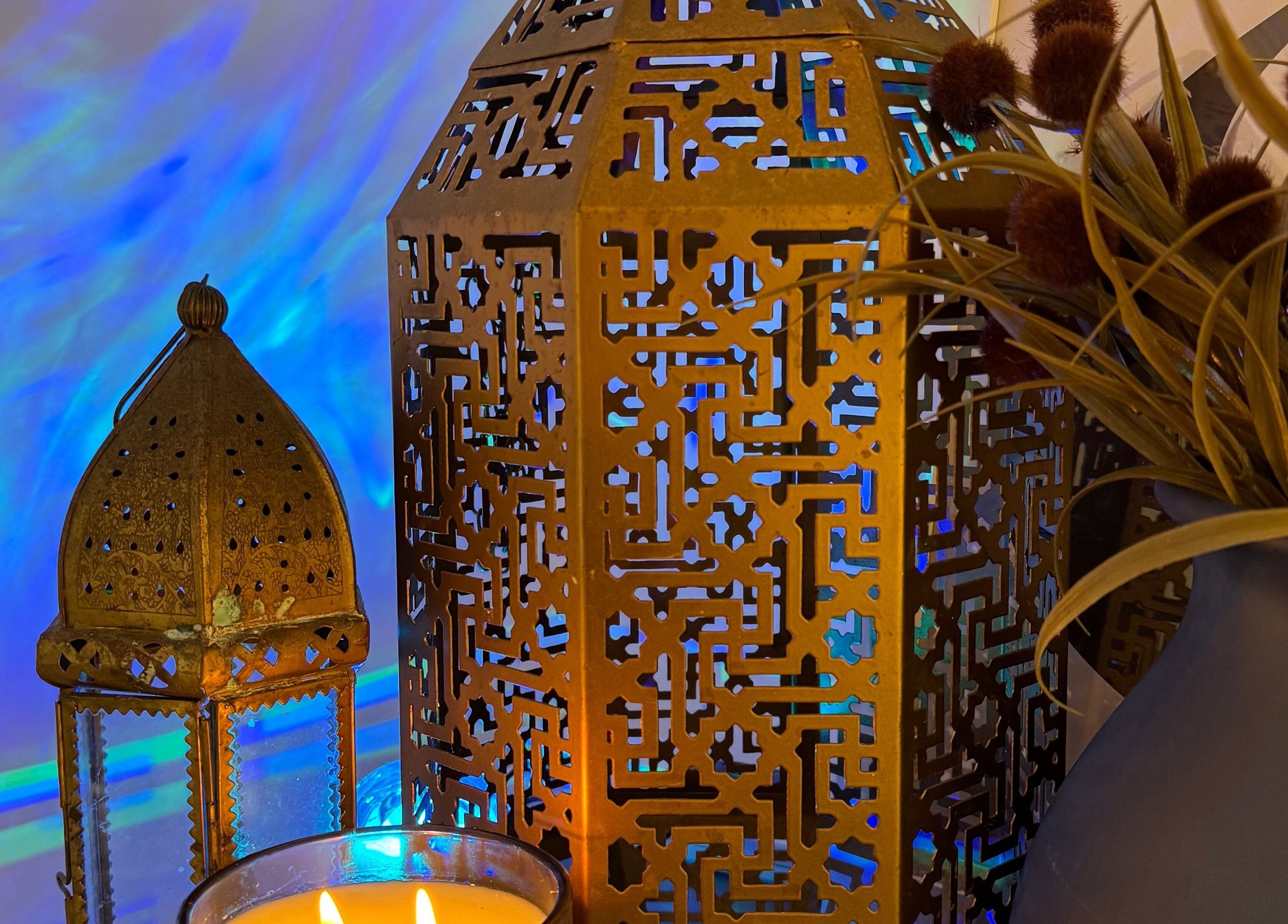 Golden lanterns and a candle create a relaxing ambiance at Kanti Studio, Colwick, England, GB.