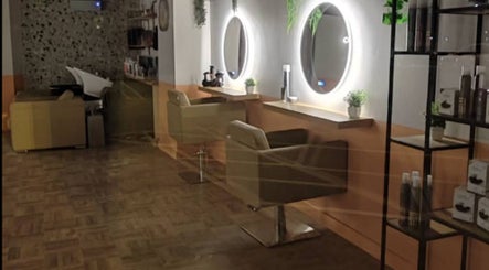 Chic, modern interior of Preston & Co Hairdressing in Clayton-le-woods, England, GB with stylish salon chairs.