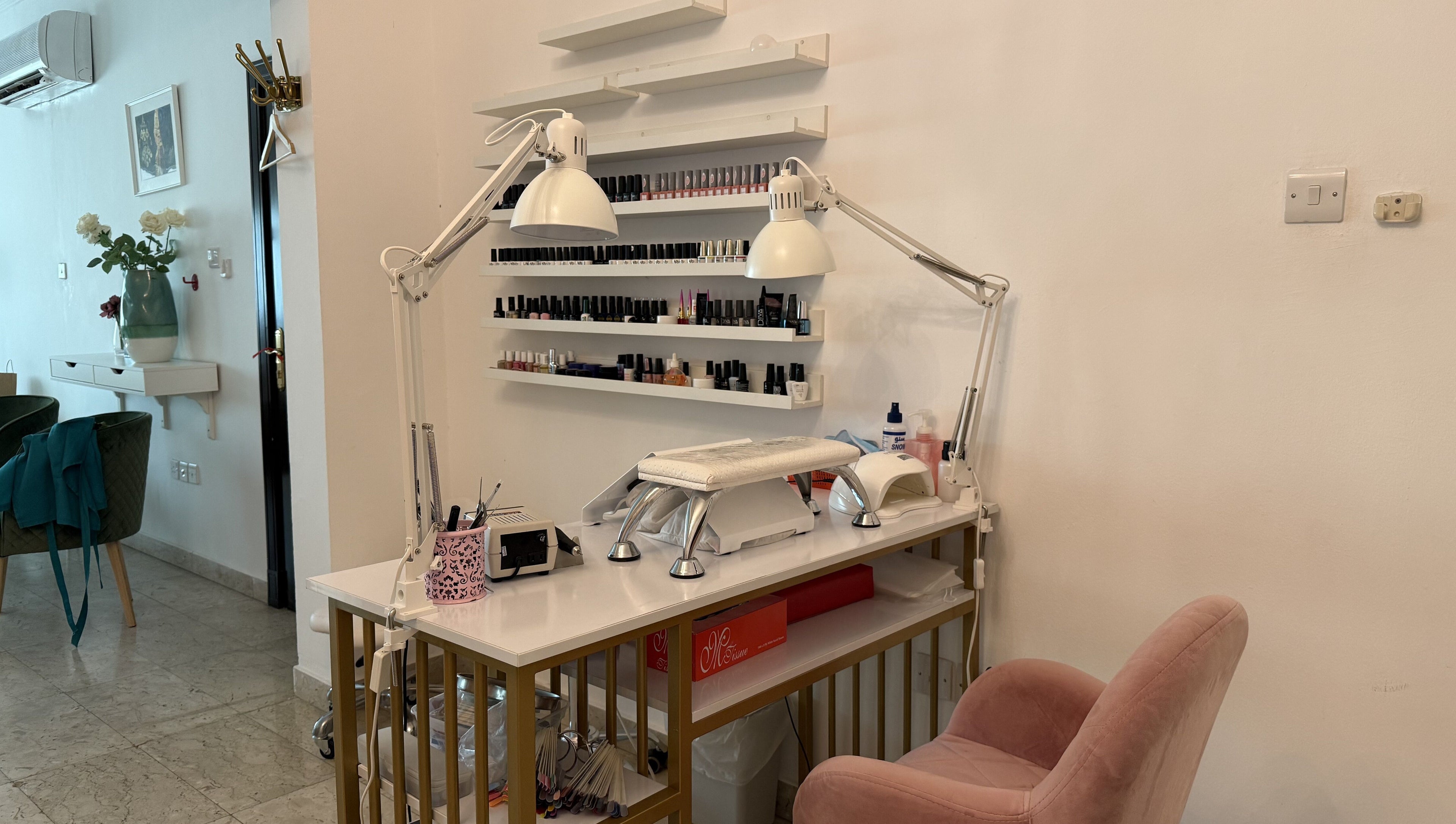 Sculptor by Aray Kairkanova nail station in Muscat, Muscat Governorate, OM with manicure tools.