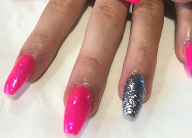 Pink and glitter manicure at Unique beauty & aesthetics, Rhosllanerchrugog, Wales, GB.