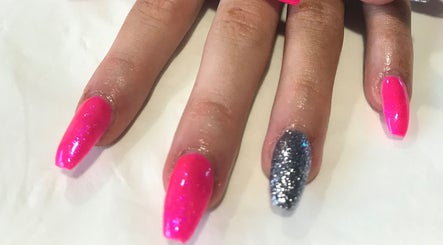 Pink and glitter manicure at Unique beauty & aesthetics, Rhosllanerchrugog, Wales, GB.