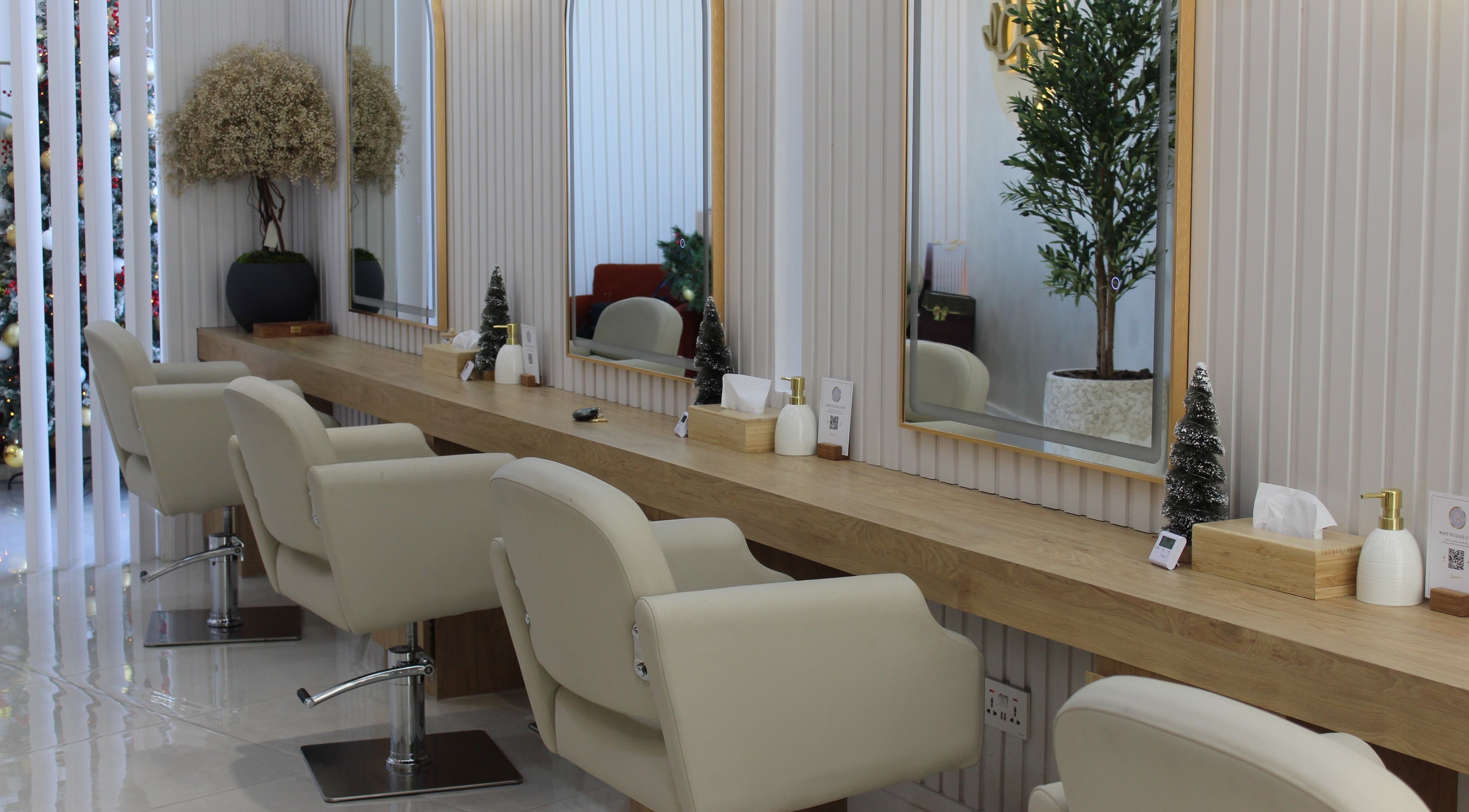 Elegant salon chairs and mirrors at La Bionda, Dubai, Dubai, AE, showcasing sophisticated decor.