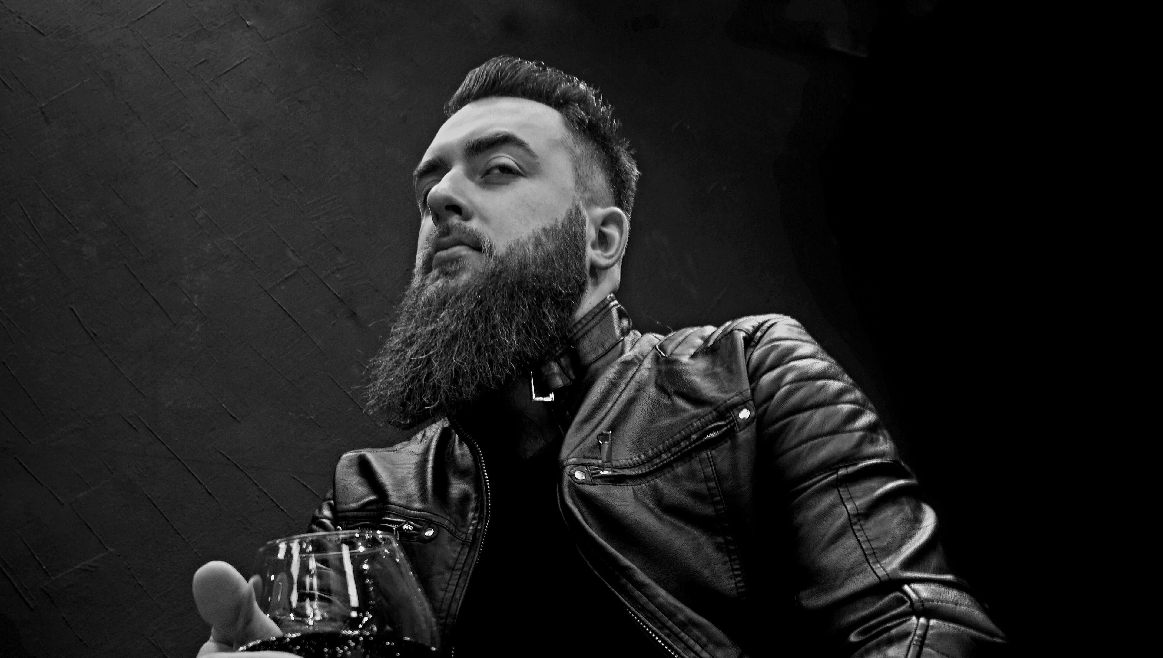 Stylish man with beard and leather jacket at LapsaBarber\M.Nometņu iela 45A in Rīga, LV.