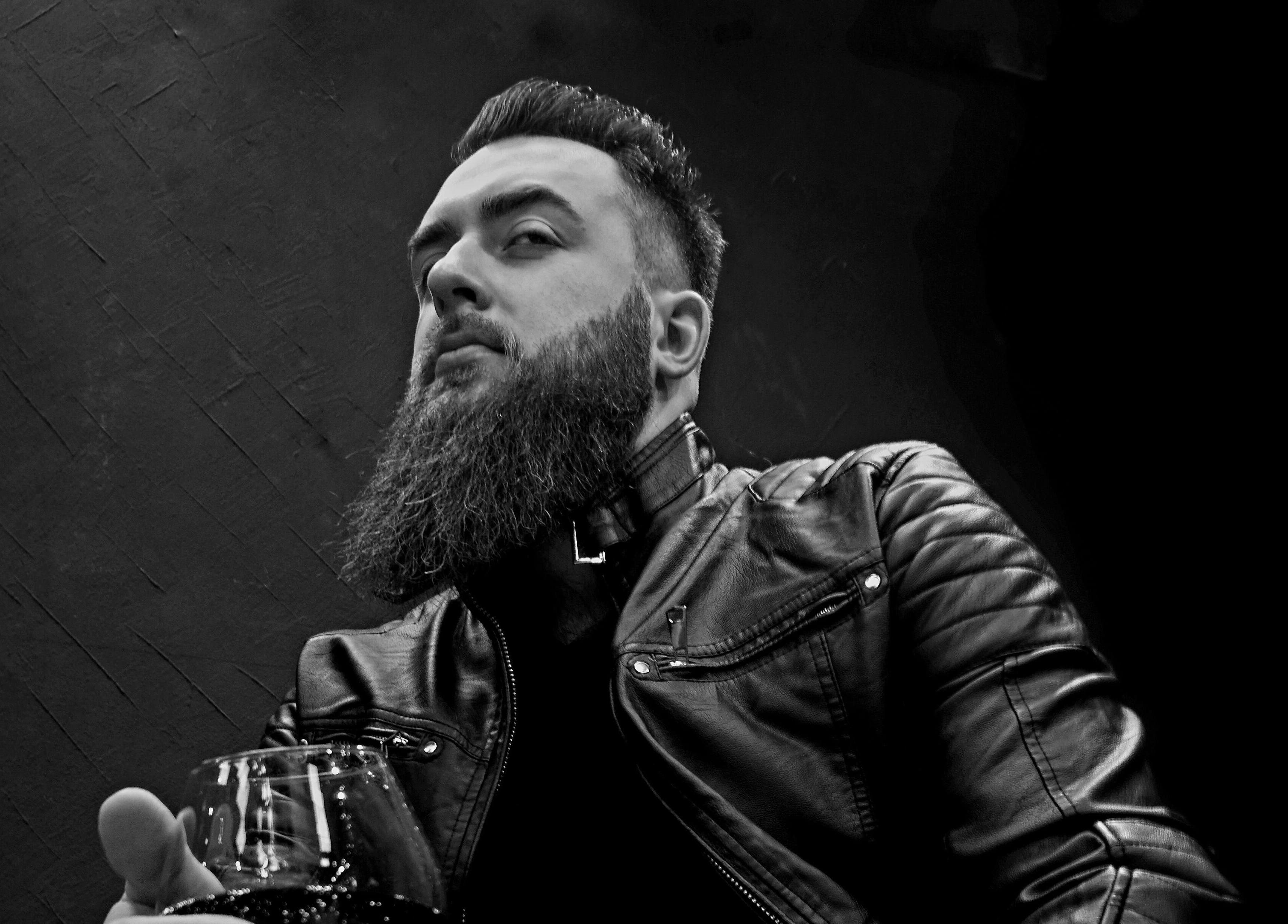Stylish man with beard and leather jacket at LapsaBarber\M.Nometņu iela 45A in Rīga, LV.