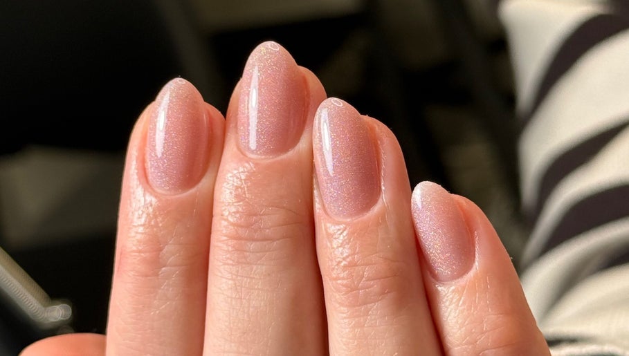 Glittery manicured nails at Ana Fernandes in Dublin, Dublin 01, IE, showcasing elegant nail art.