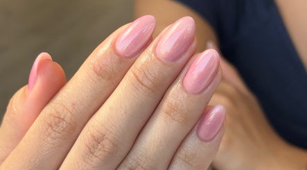 Glossy pink manicure at Ana Fernandes, Dublin, Dublin 01, IE showcasing elegant nail artistry.