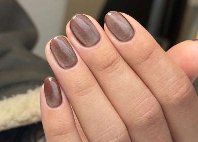 Stylish manicure with brown polish at Ana Fernandes, Dublin 01, IE. Perfect for your next beauty appointment.