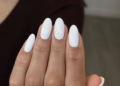 Beautiful manicured nails at Ana Fernandes, Dublin, Dublin 01, IE, showcasing glossy white polish.