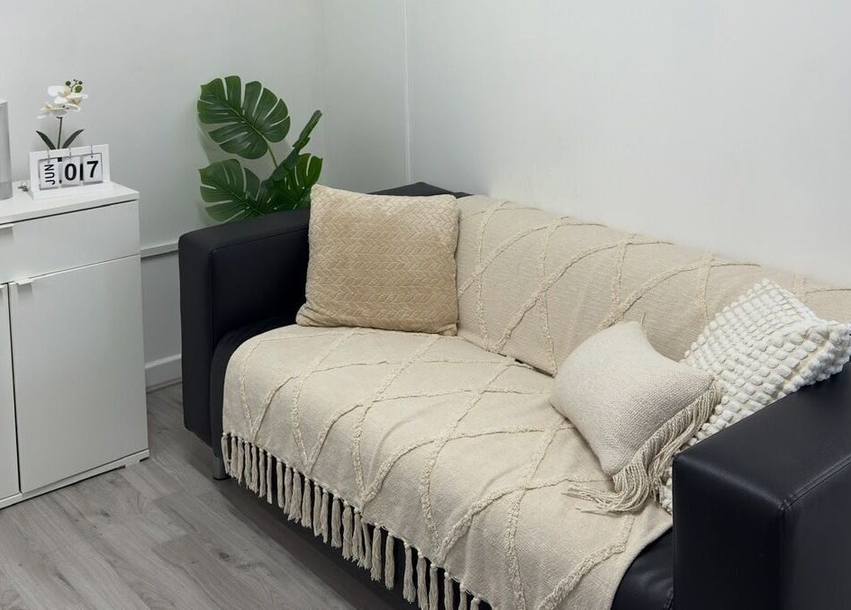 Stylish lounge area at Ana Fernandes, Dublin 01, IE with modern decor and comfortable seating.