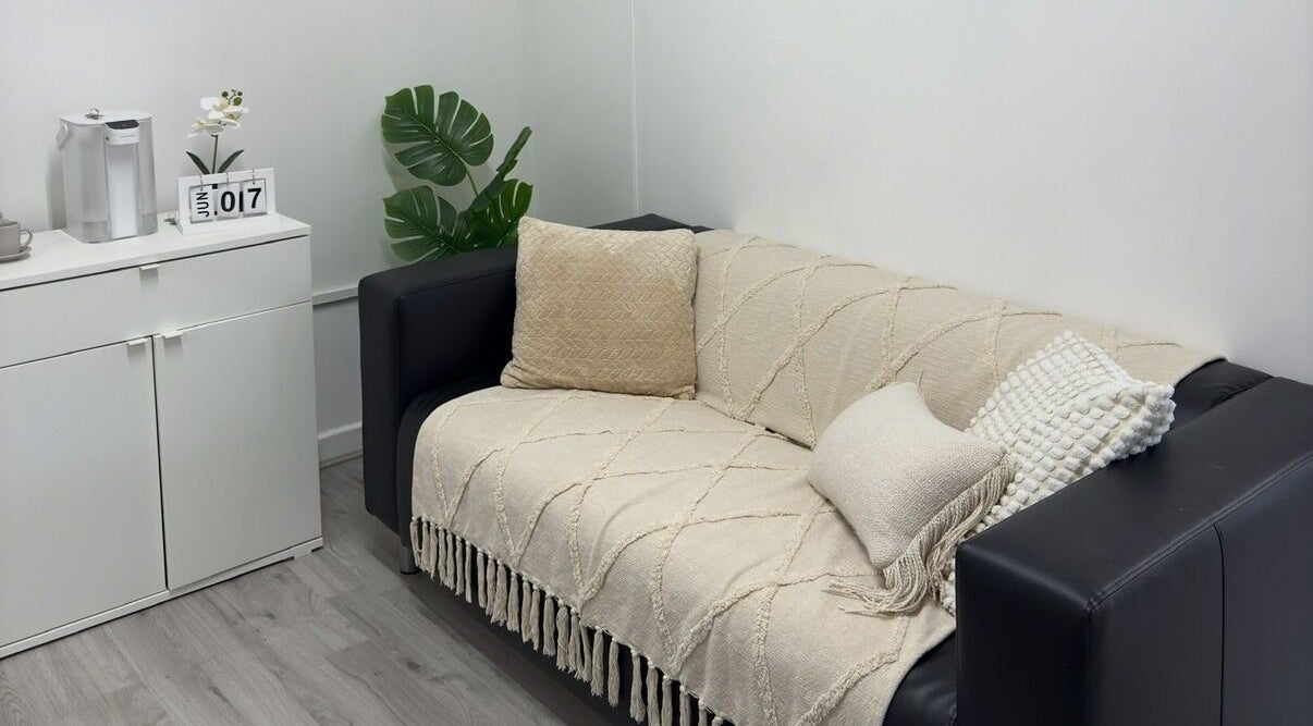 Stylish lounge area at Ana Fernandes, Dublin 01, IE with modern decor and comfortable seating.