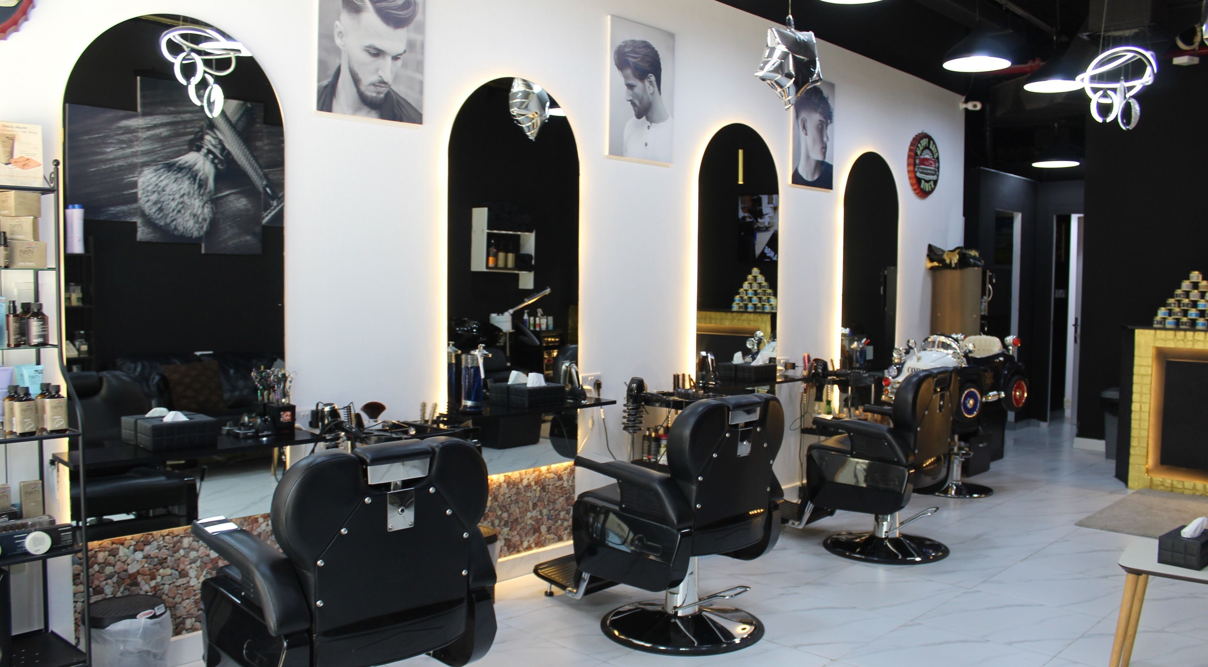 Modern and stylish interior of Avenue Man Barbershop in Dubai, Dubai, AE with sleek barber chairs and decor.