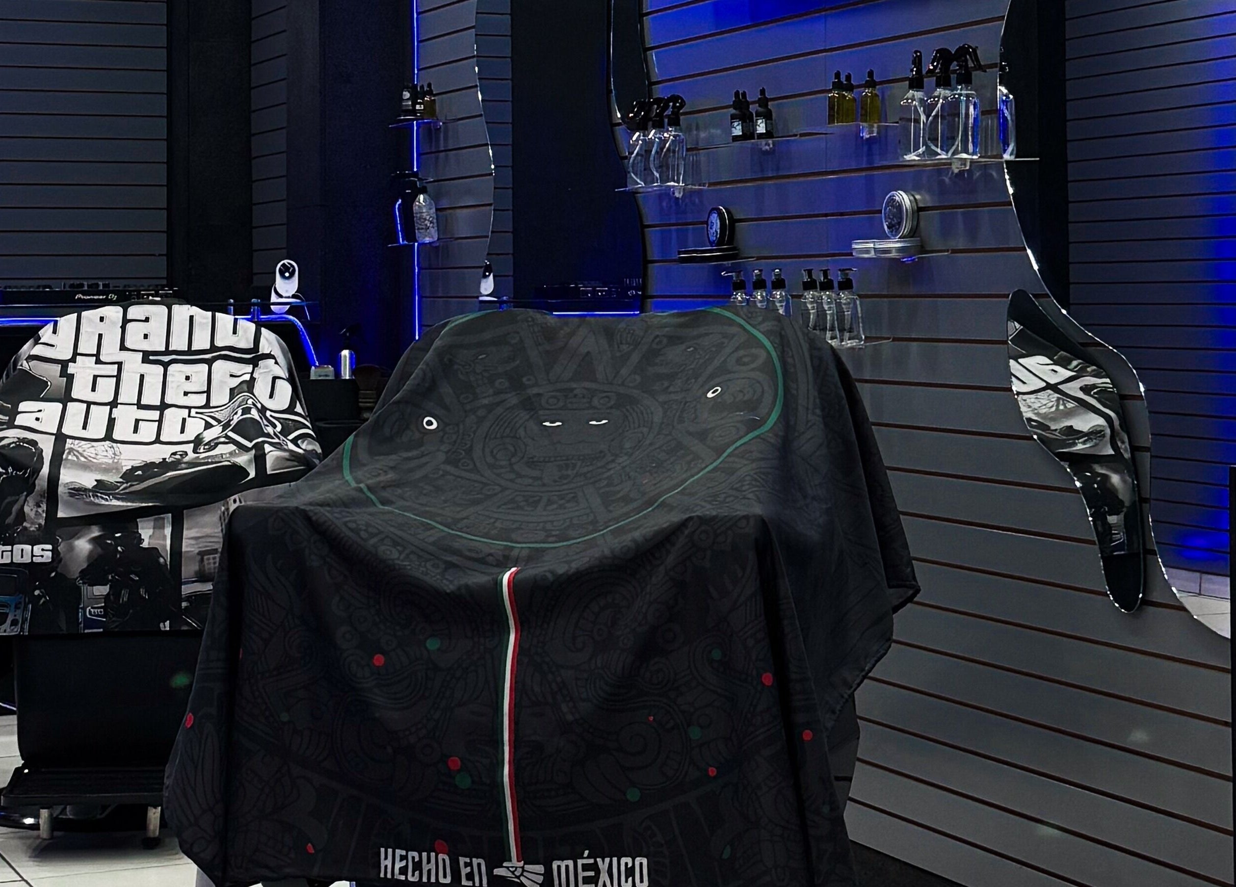 Chic barber setup at Barberia Mercurio, Zapopan, Jalisco, MX featuring sleek décor and grooming tools.