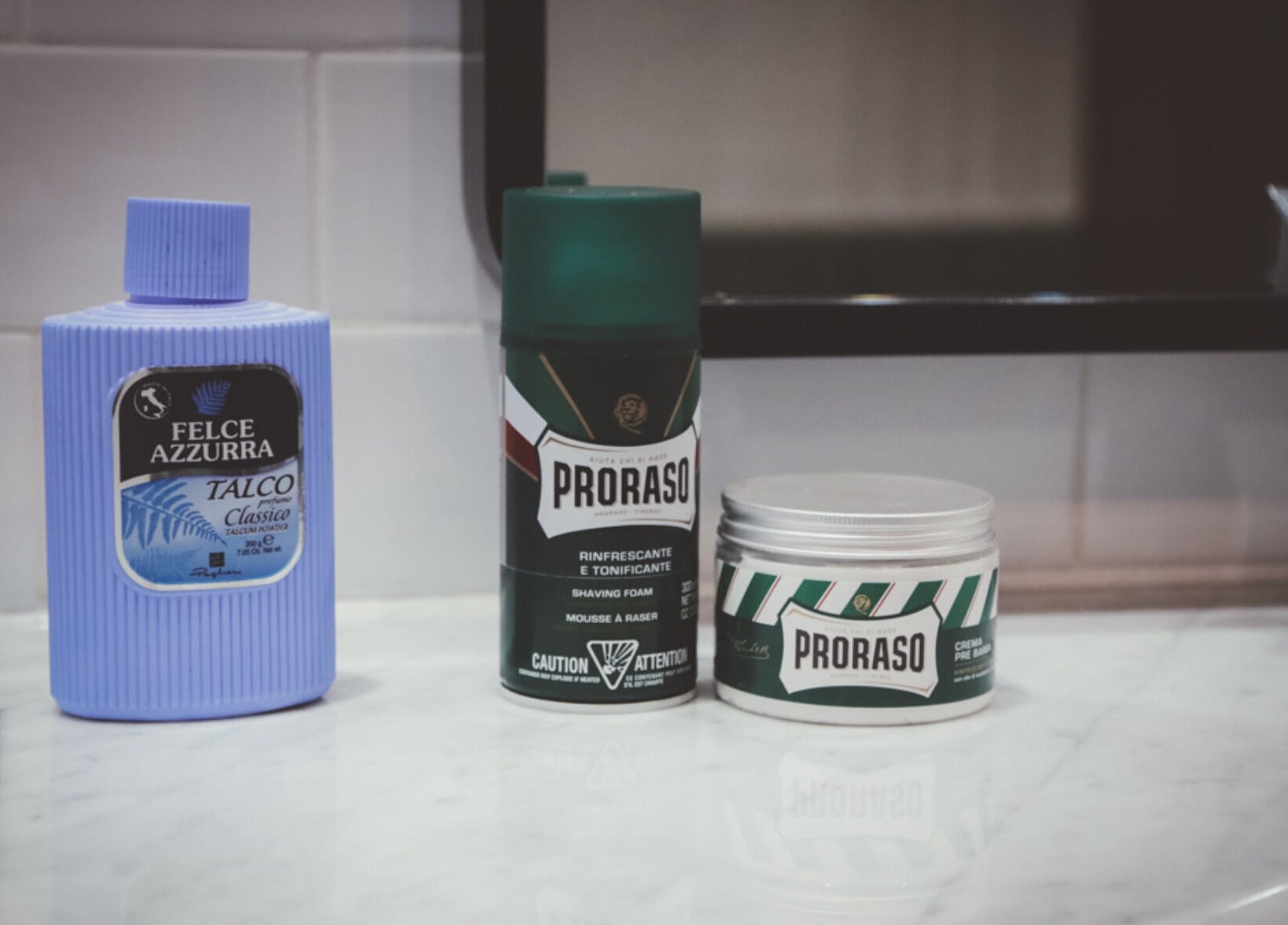 Grooming products at Alpha Barbers - Flinders Lane, Melbourne, Victoria, AU, including Proraso shaving foam.