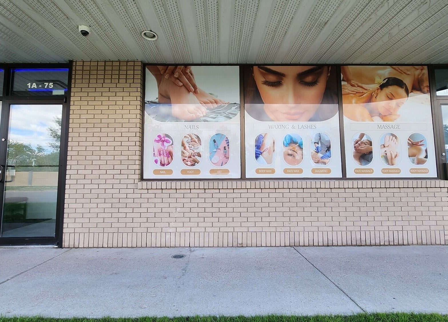 Entrance of Blissful Spa in Saskatoon, Saskatchewan, CA showcasing services like nails, waxing, and massage.