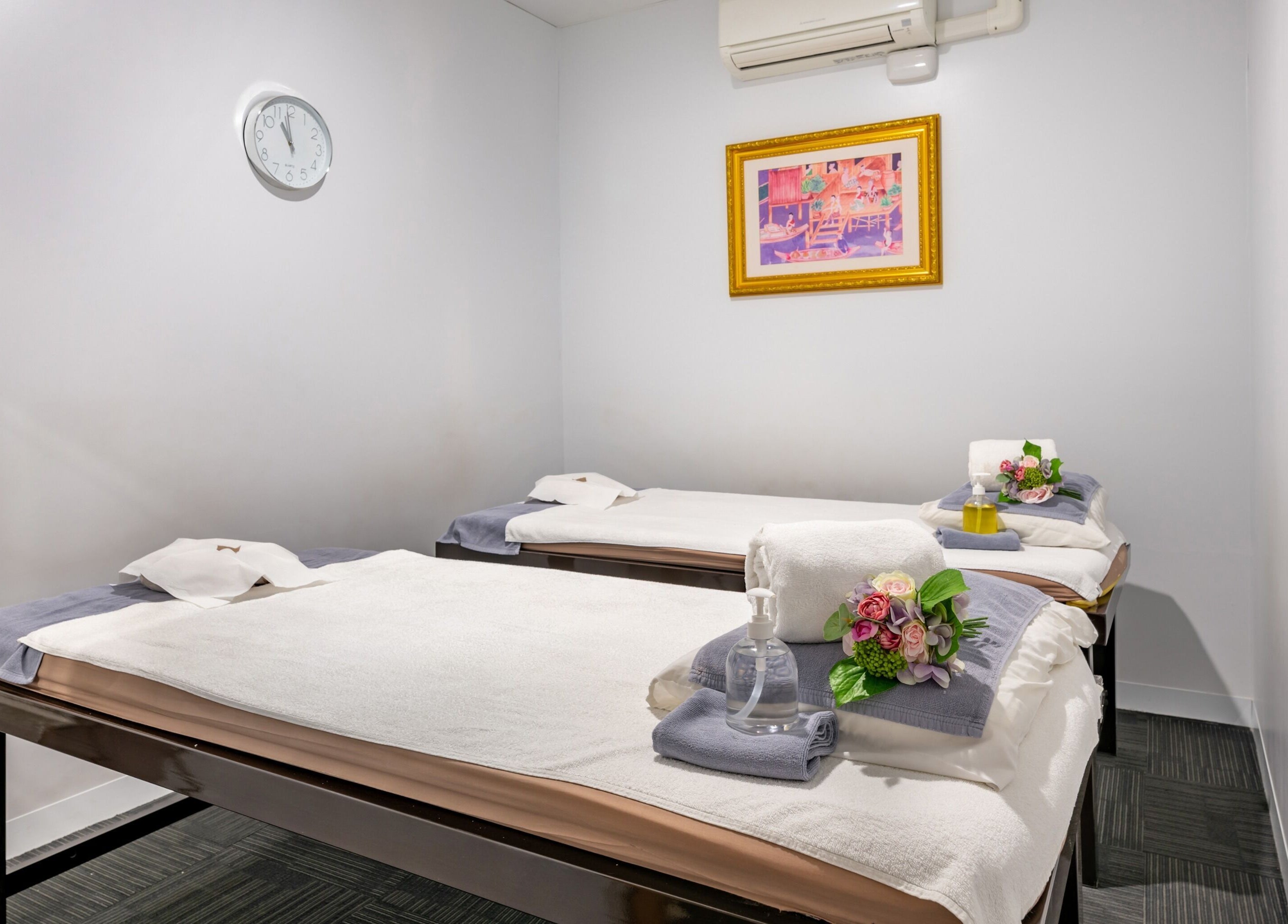Relaxing massage room at Vigorous Thai - Moonee Ponds, Moonee Ponds, Victoria, AU, with two treatment beds.
